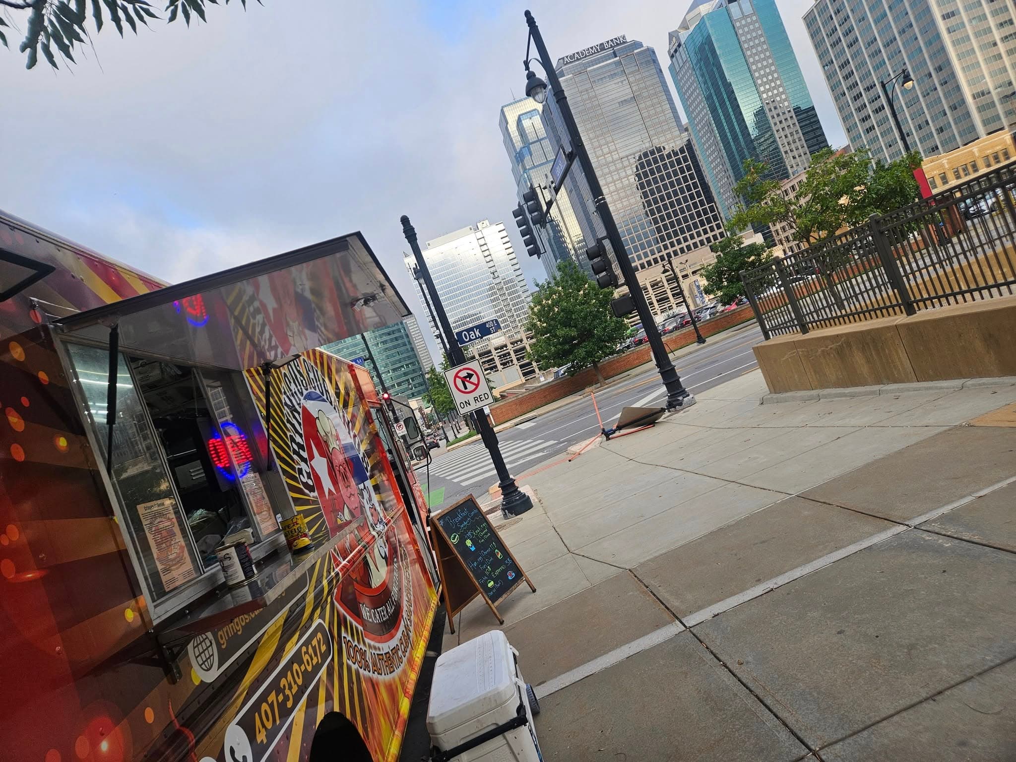Bright Gringos Cubanos truck against evening skyline
